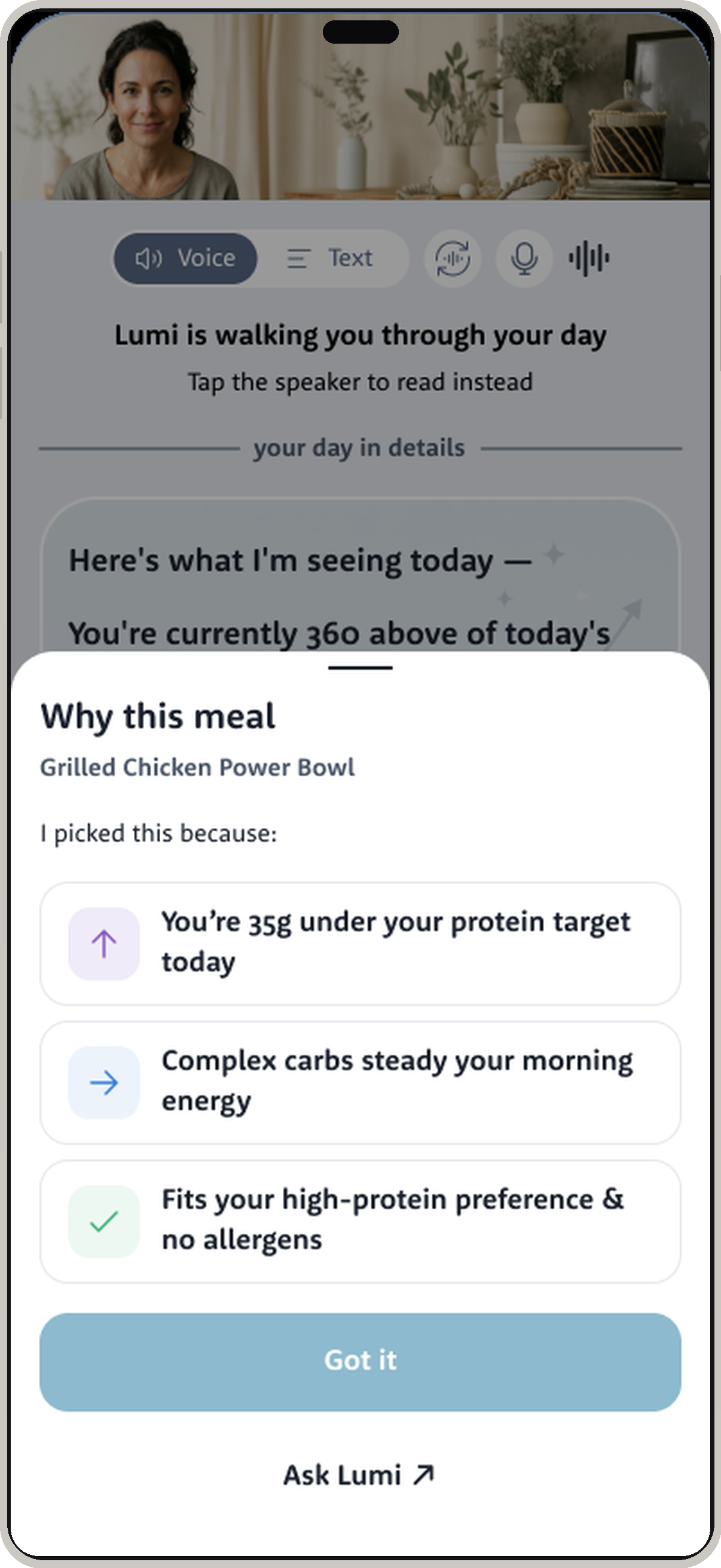 The Why this meal screen in the Lumi app inside an iPhone frame, showing the reasons Lumi picked a Grilled Chicken Power Bowl